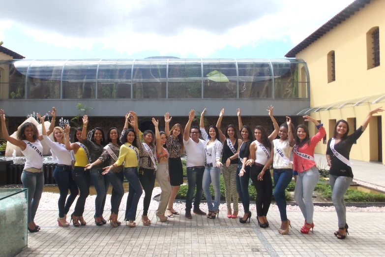 a group of girls posing for a po