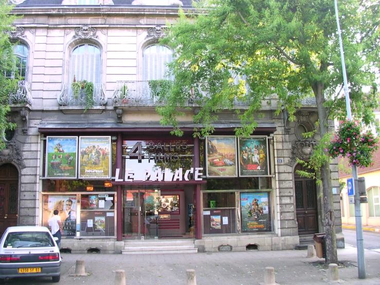 an old stone building has multiple windows