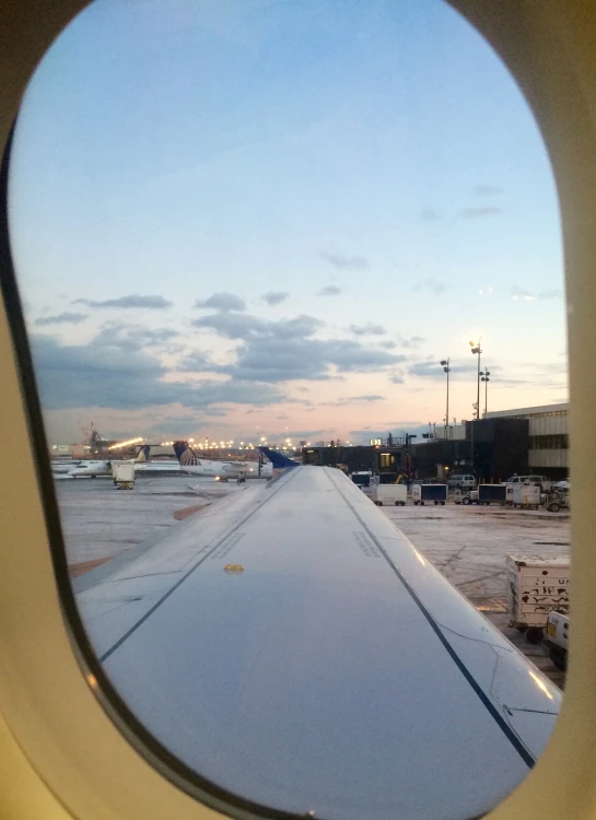 an airplane wing seen from inside a window