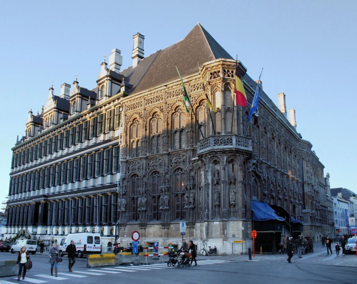 an old building that has a tower with three stories