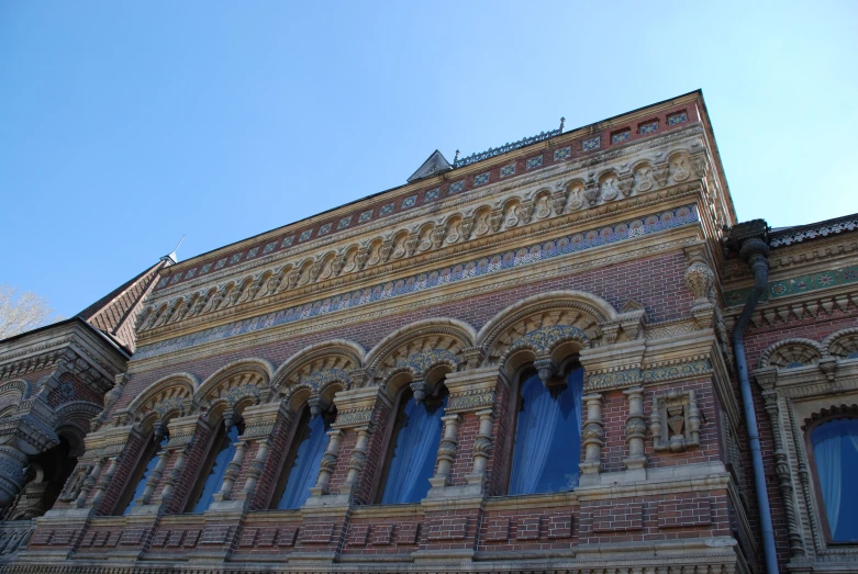 an old building with a large tower and window panes