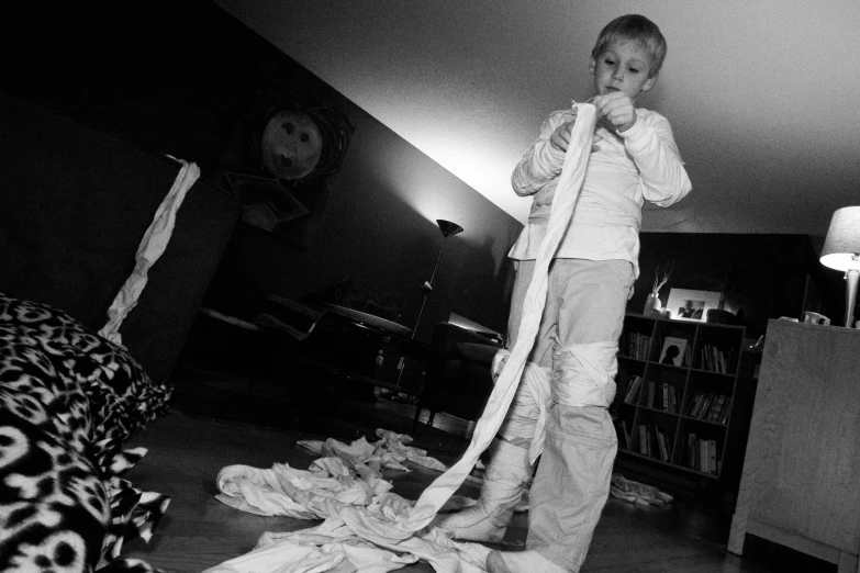 a  playing with toys in his living room