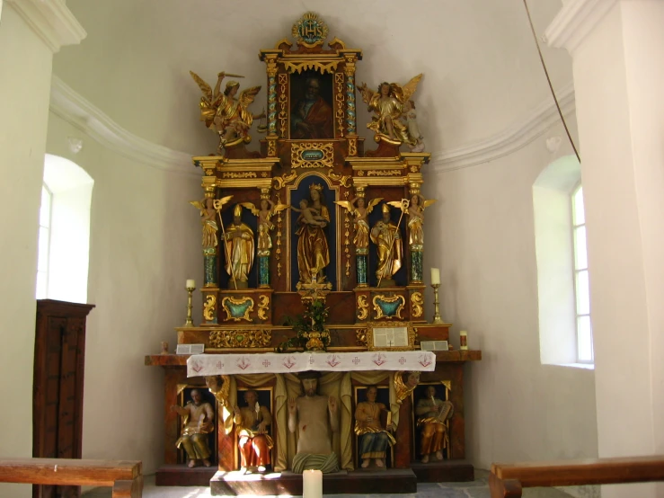 a alter in a church with golden accents