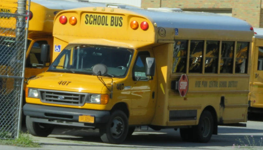 a group of buses parked next to each other