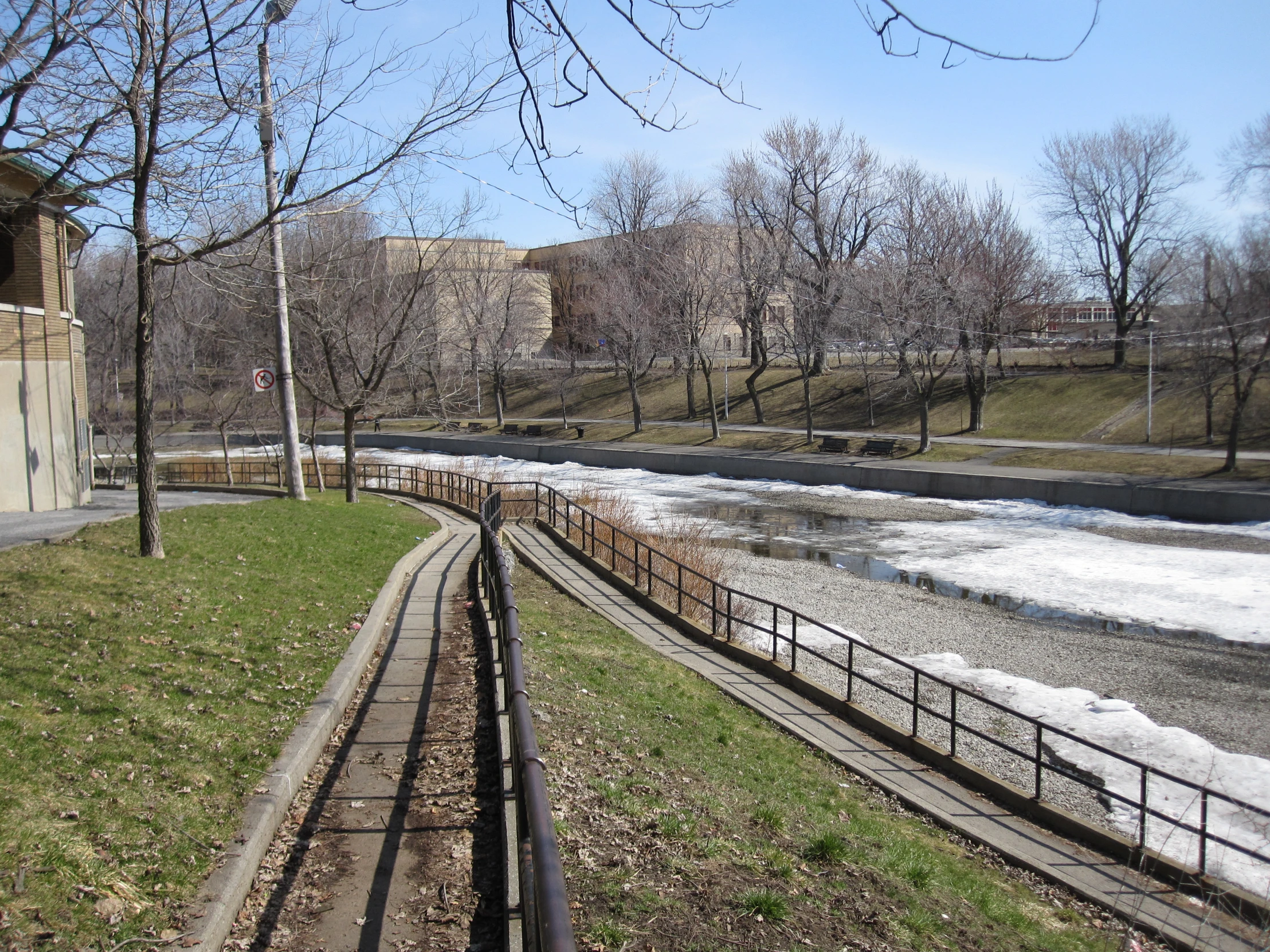 a set of tracks next to a river