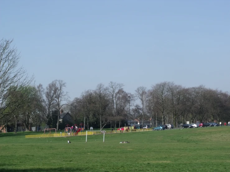 many people are playing soccer in a field