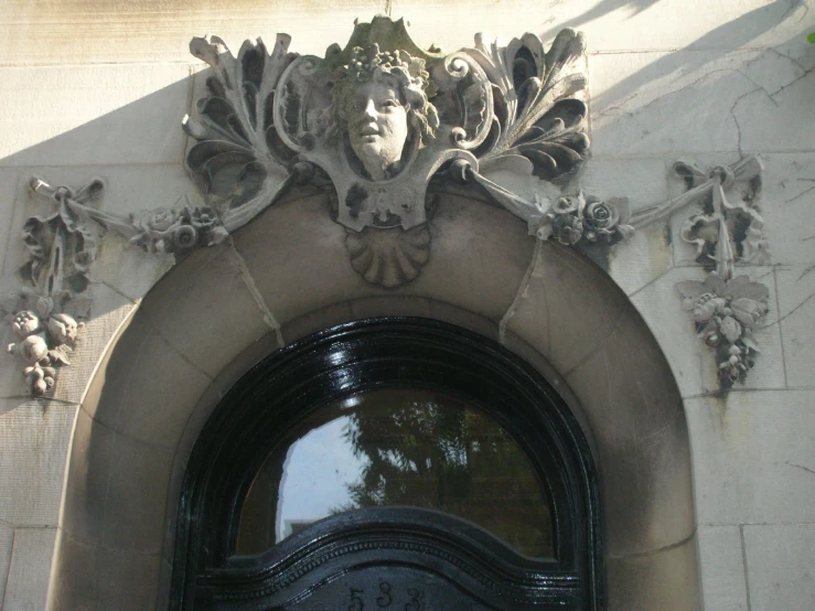 a large window that has carvings on it