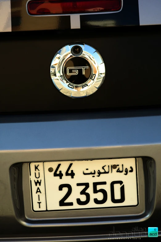 the emblem of an automobile is displayed on the rear bumper