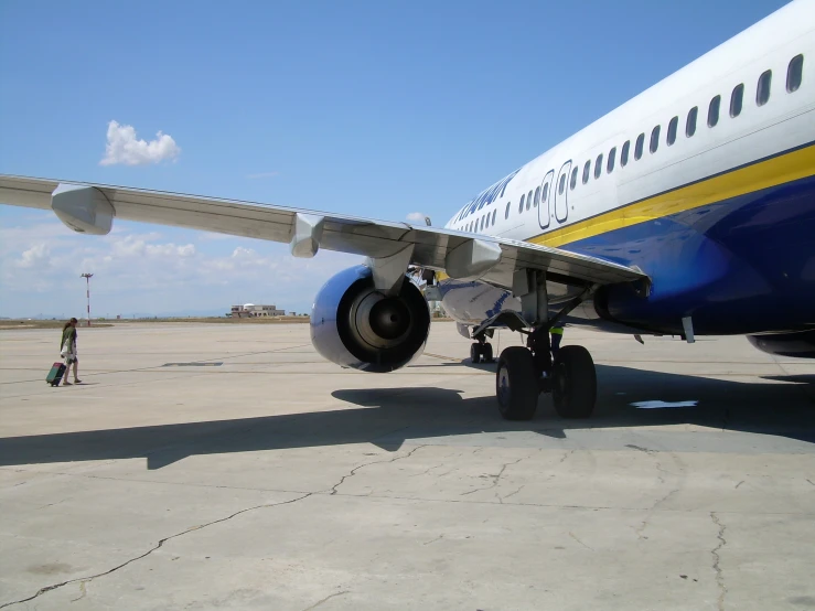 the side of a passenger plane, with it's ke up