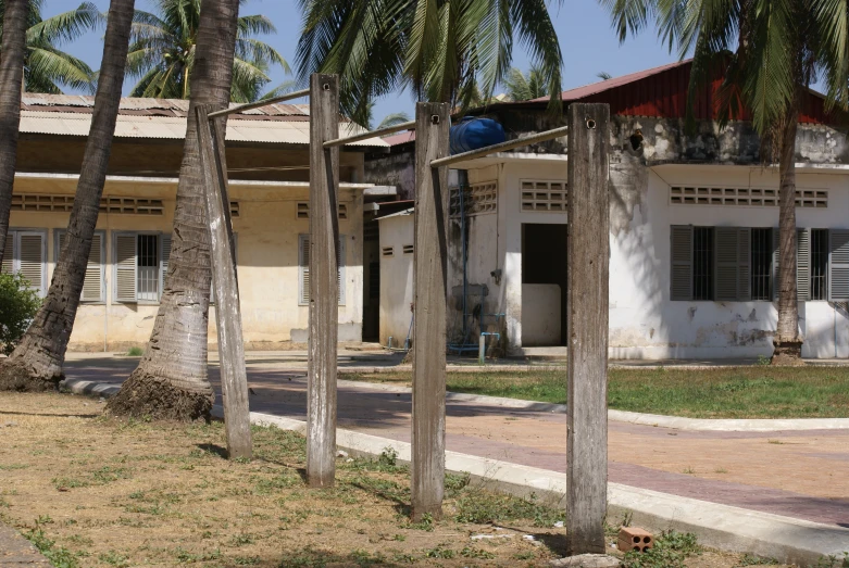 old homes near a path in a tropical country