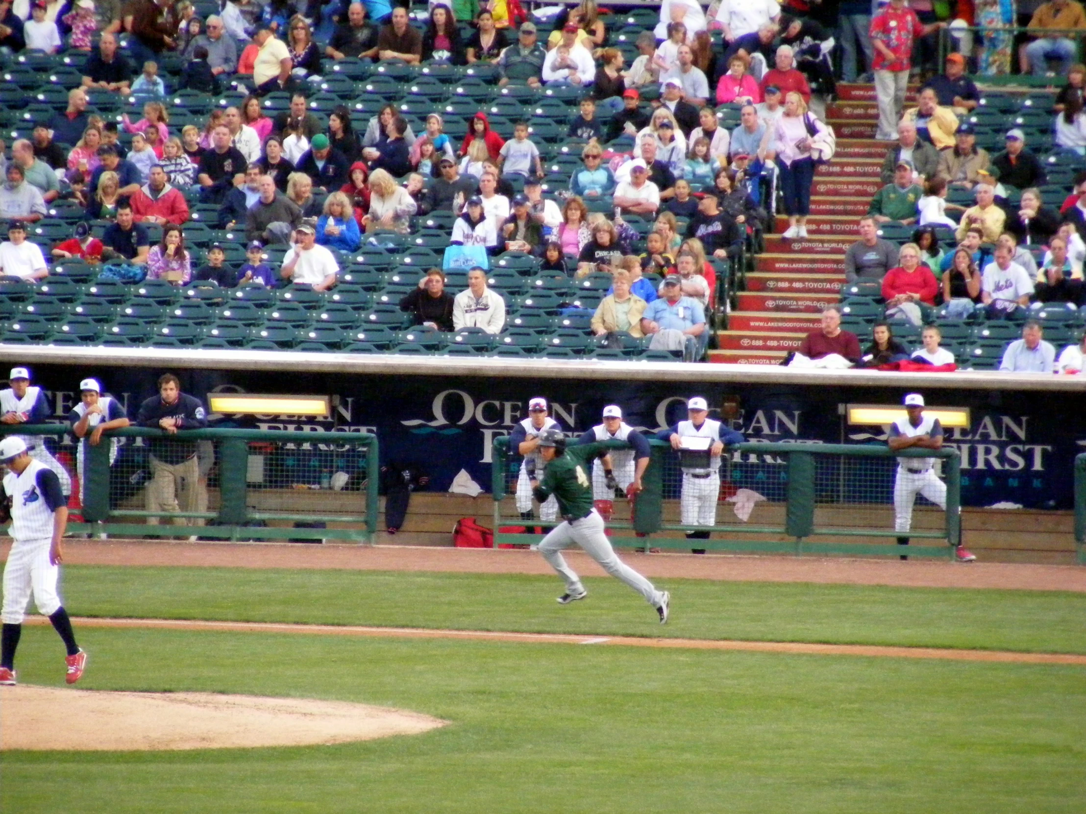 there is a man that is running on the field