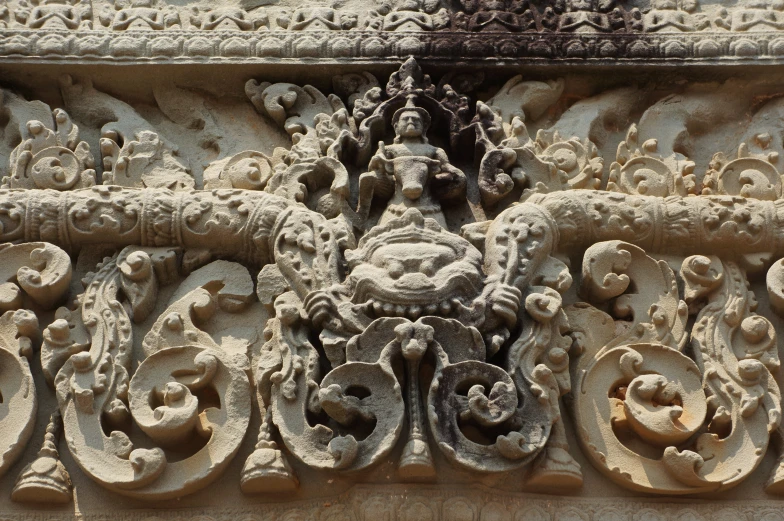 a decorative object on top of a building wall