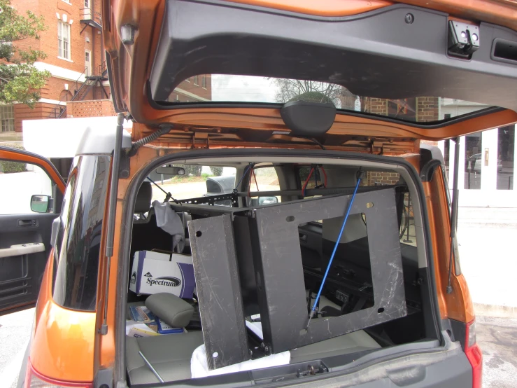 a trunk with a door that has the windows open and the radio on