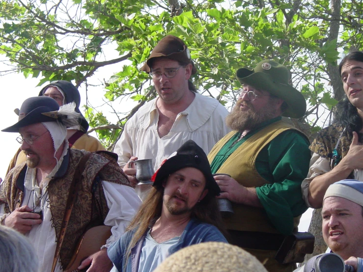 a group of men wearing funny costumes on their shoulders