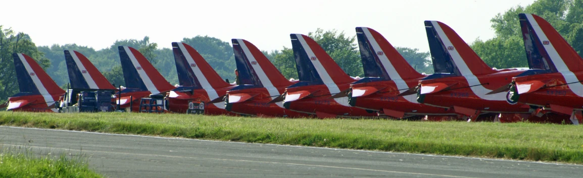 several rows of air craft at an airport