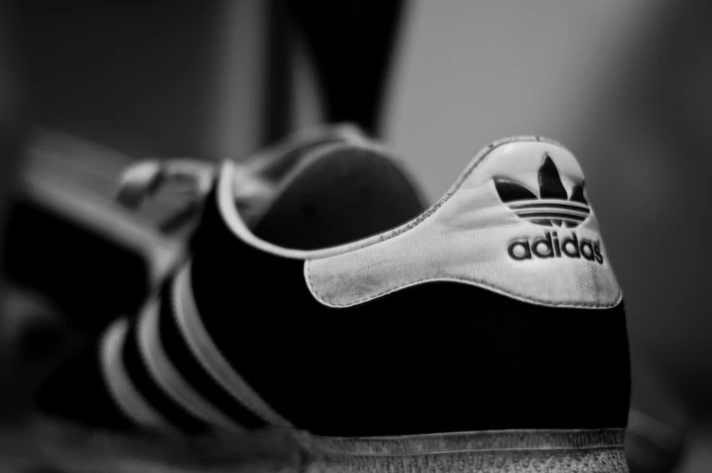 a black and white po of a person's shoe