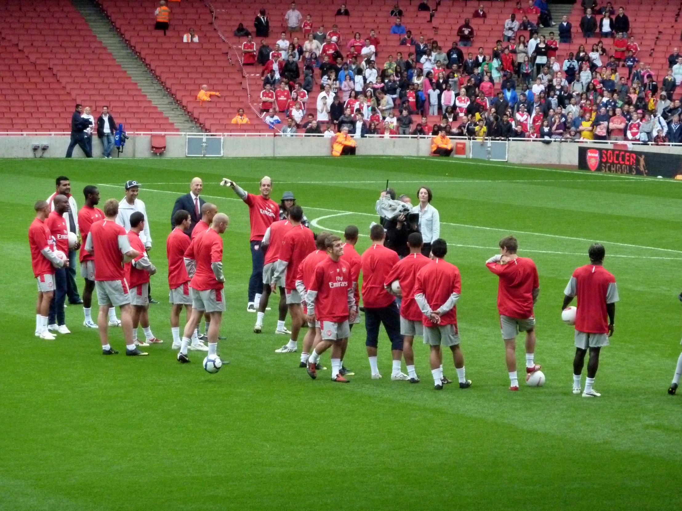 a soccer team on a field at the stadium