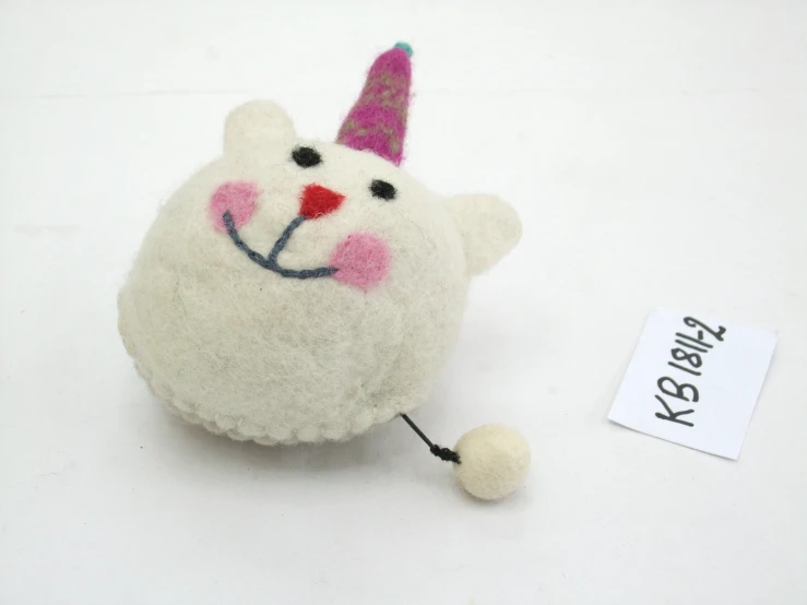 small needle felt animal toy with an unicorn hat