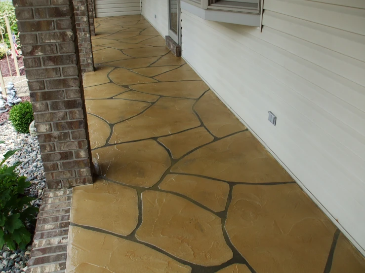 a walkway made of rocks on a patio