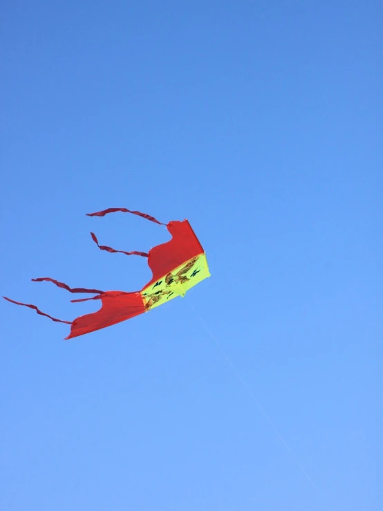 there is a kite that looks like a hand