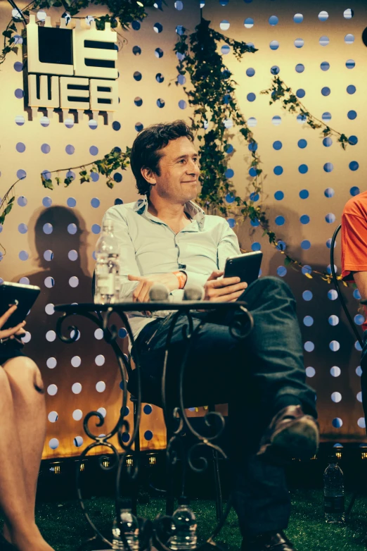 a man and woman are seated next to each other