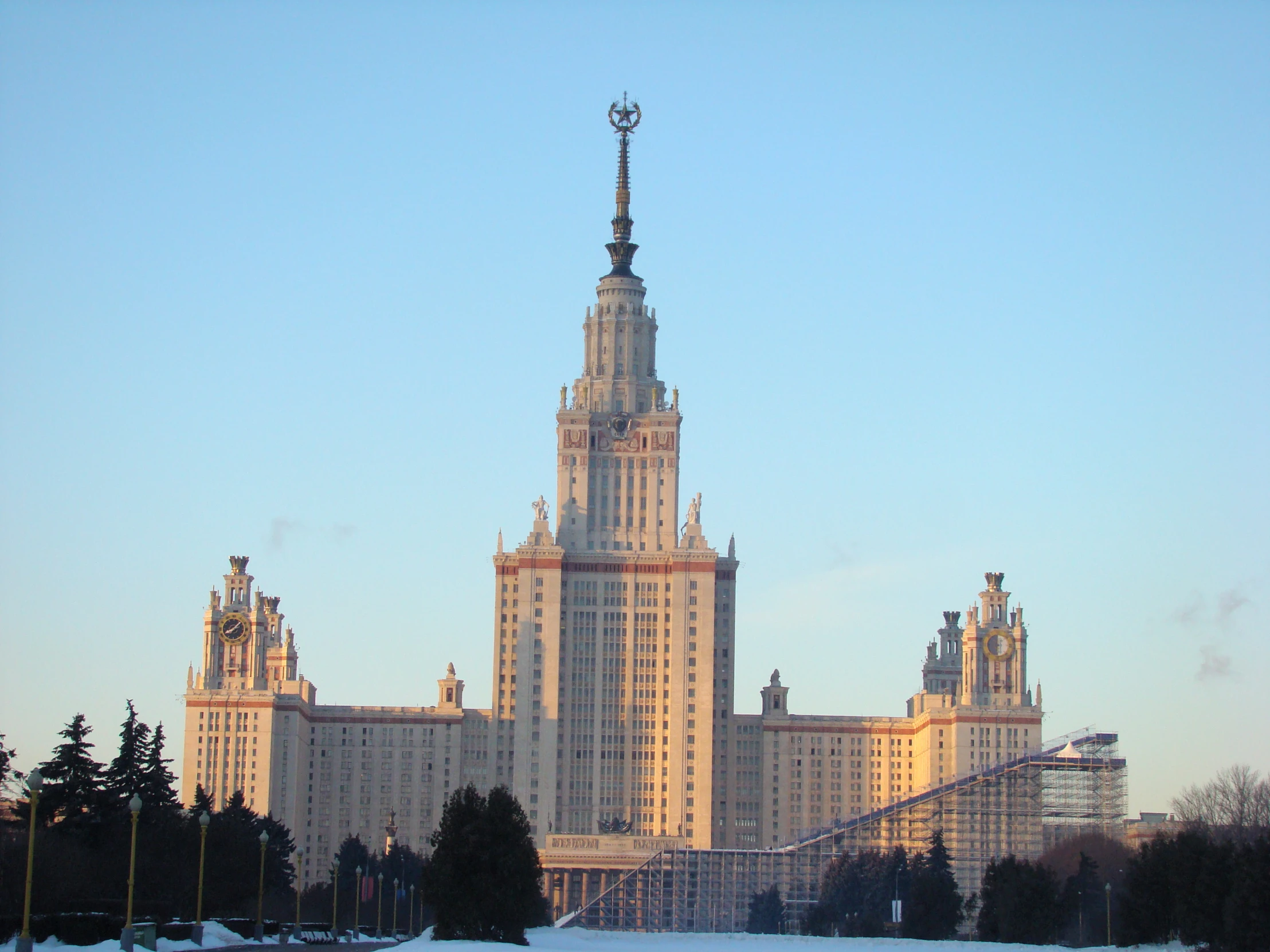 a view of the russian state building and surrounding trees