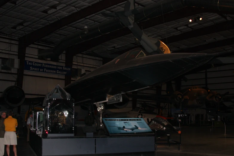 a museum exhibit with an aircraft on display