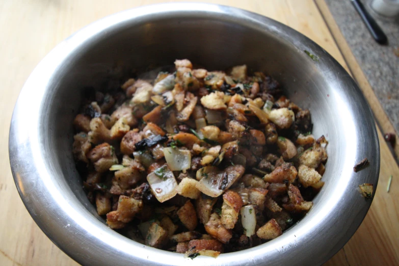 the large pot is full of food on the table