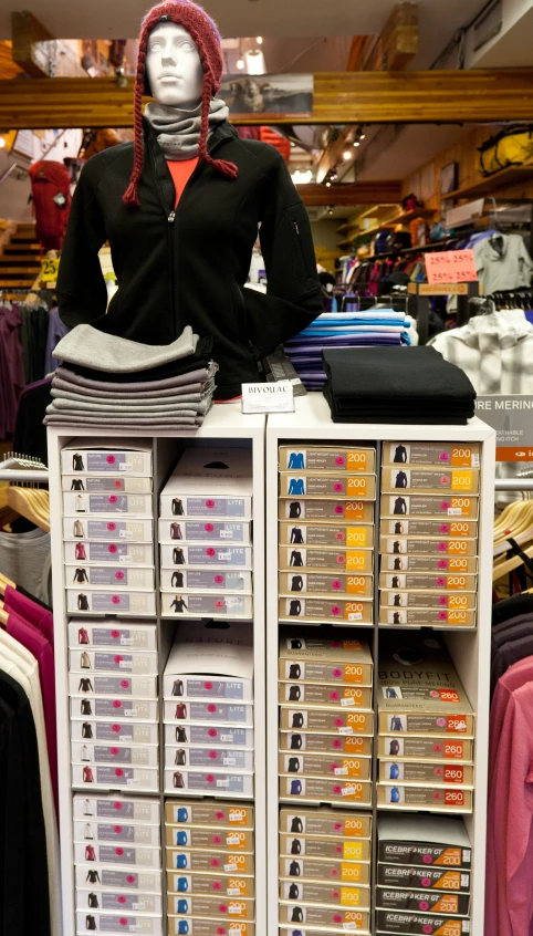 the display at a clothing store has many different colors