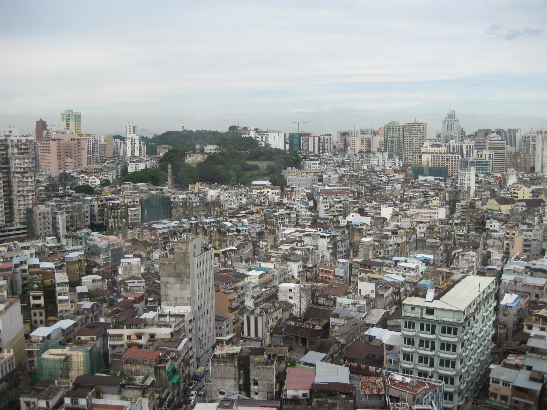 a large city with buildings and lots of roofs