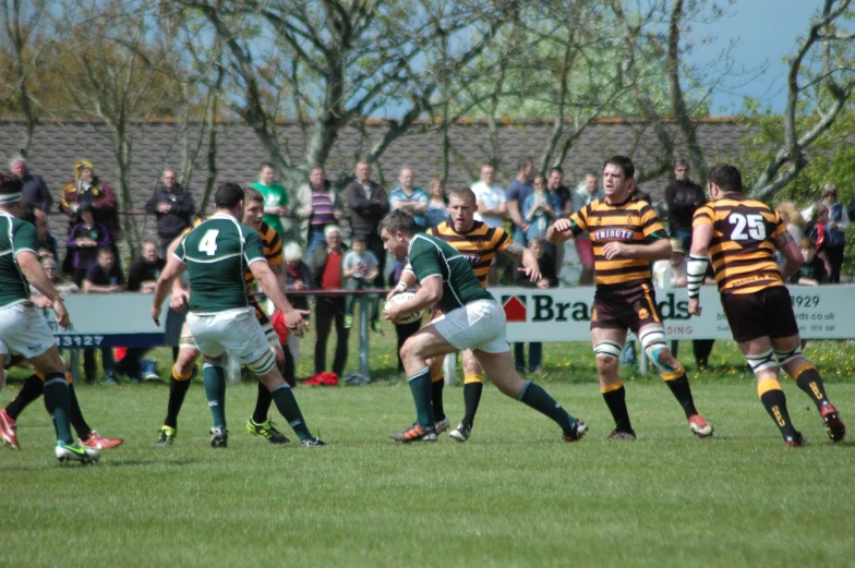 rugby players going for the ball during a game