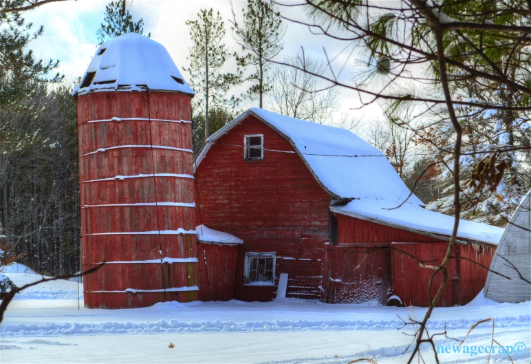 this is a po of a red barn in the snow