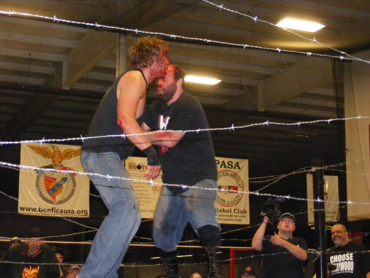 a man and woman in the middle of wrestling