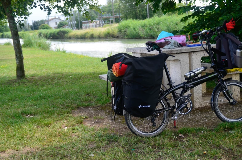 there is a bike parked near the water