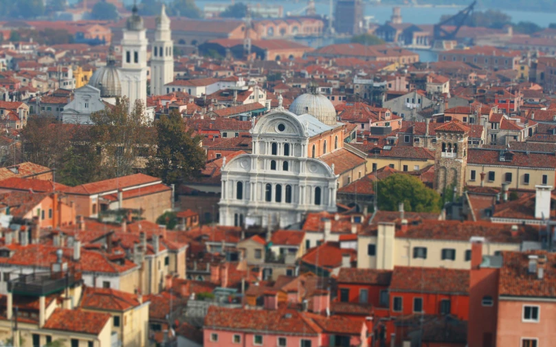 the cathedral is white and gray in a red rooftop