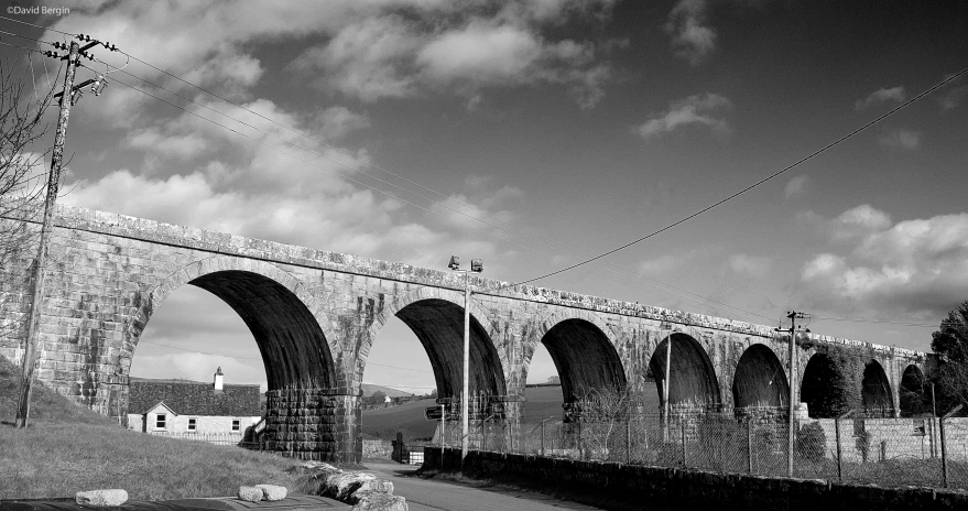 an old bridge with several arches and arches on top