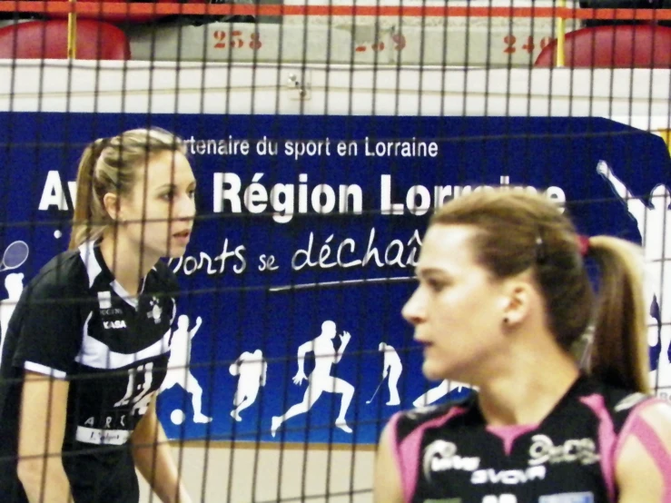 an image of a woman playing volleyball on the court