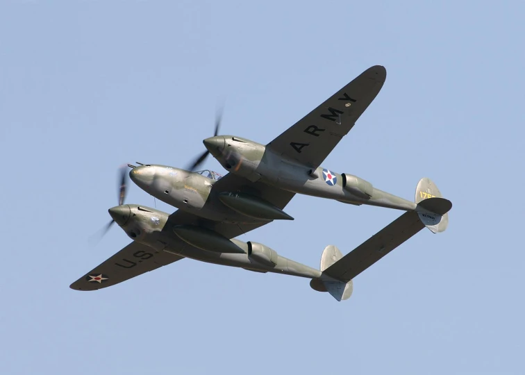 two air planes flying in the blue sky