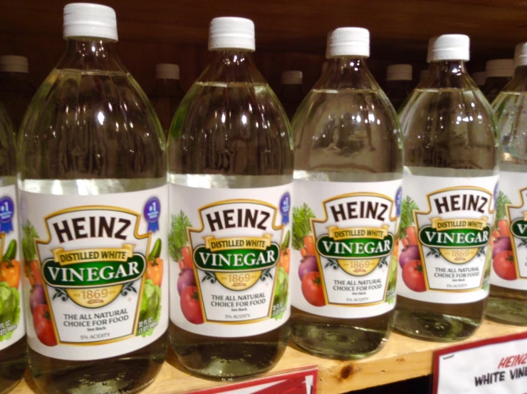 many bottles of vinegar are on the shelf