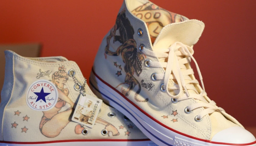 the high - top converse converses features an image of a dog