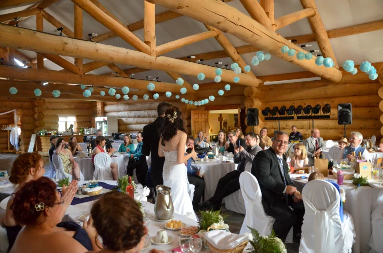 the bride and grooms share a dance together