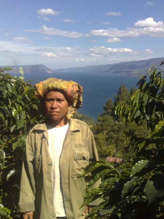 an image of a man standing in front of trees