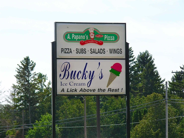 an advertit sign for a pizza and salads store