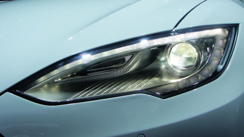 an illuminated head light with its chrome finish