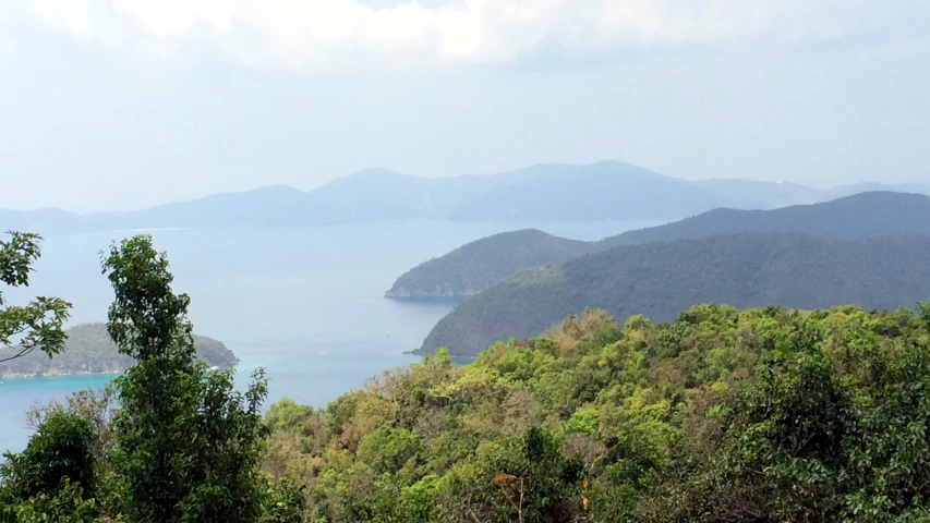 a scenic view looking out from a distance over the water