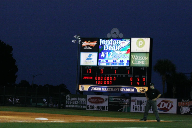 the scoreboard at the baseball game is clearly showing