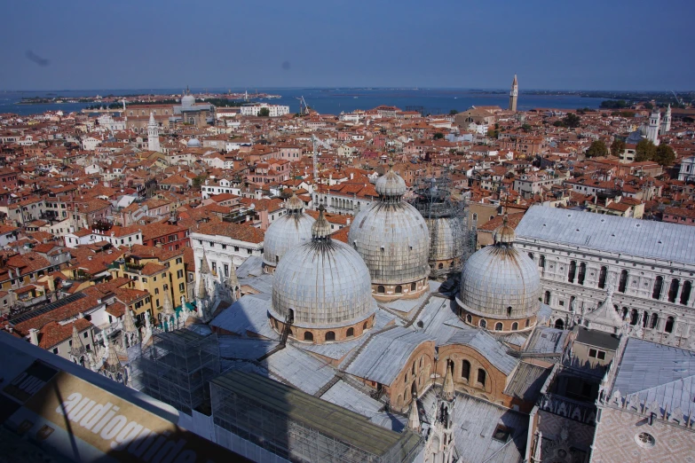 a large church and other large city with tall buildings