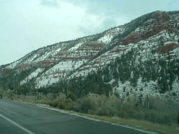 the mountains of the snow are covered in white