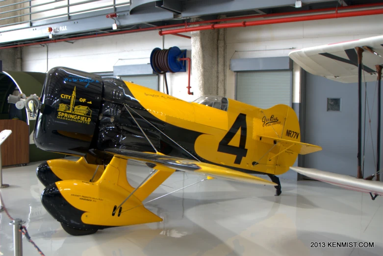 a plane in the air museum being displayed