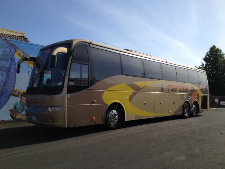 a large bus parked in front of a building